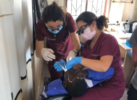 Doctor Bassily volunteering to provide dental treatment