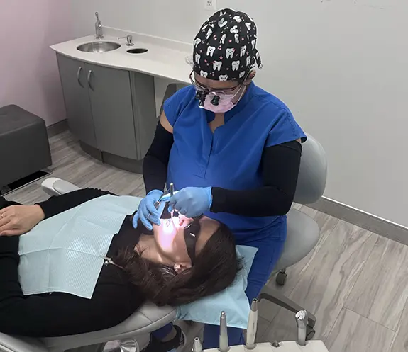 Dentist treating dental patient