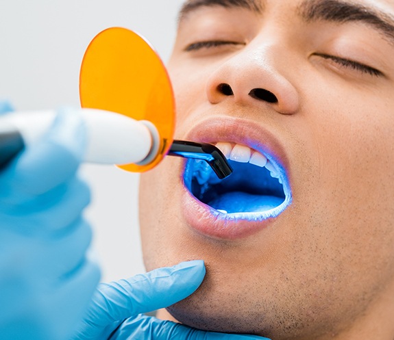 Patient receiving cosmetic dental bonding