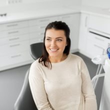 Woman in dental chair for preventive dentistry