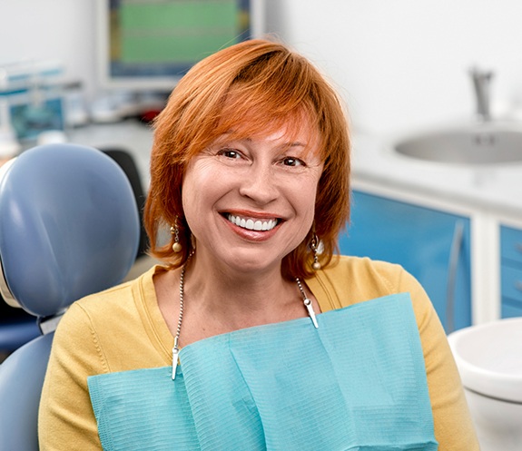 Woman smiling after scheduling visit