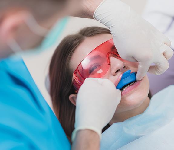 Child receiving fluoride treatment