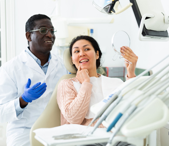 Woman smiling in the dental chair