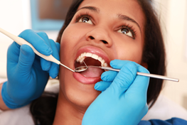 Woman receiving dental checkup