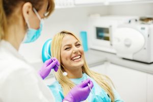 woman smiling in dental chair